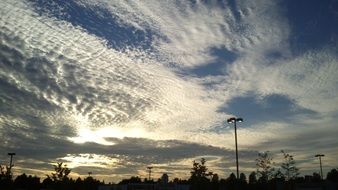 dynamic Cirrus clouds at sunset sky