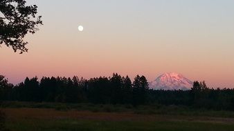 mount rainier with full moon landscape