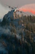 aircraft flying over mountains