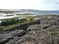 Beautiful iceland tectonic plate warp landscape with plants