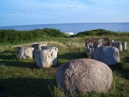 round stones on a green field