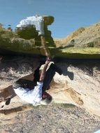 photo of Reflection of the grandpa in water