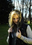 uncertain blonde young girl outdoor