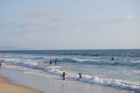 girls among the ocean waves