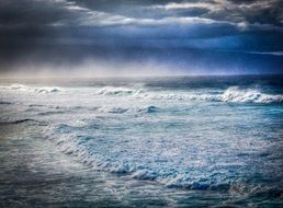 Storm on the beautiful beach under clouds on Northern Maui in Hawaii