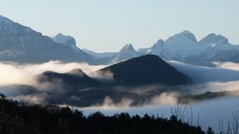 Landscape of the mountains in clouds in the morning