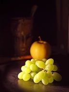 still life with grapes and apple