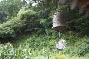 metal bell at the entrance to the temple