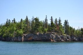 Landscape with the trees on the rocks