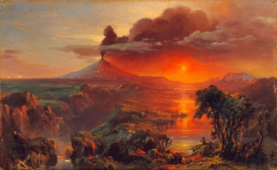 sunset on the background of the volcano and the ocean
