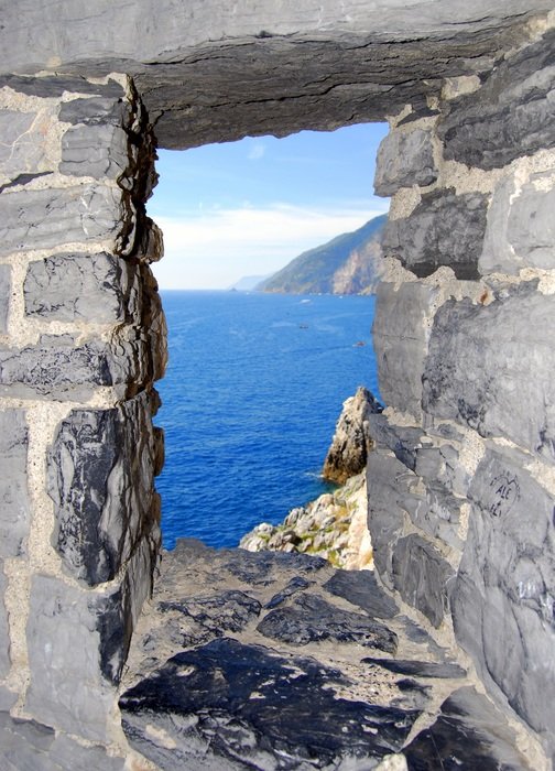 View of the mountain through a chamber window