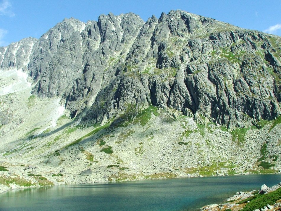gray mountains near water in slovakia