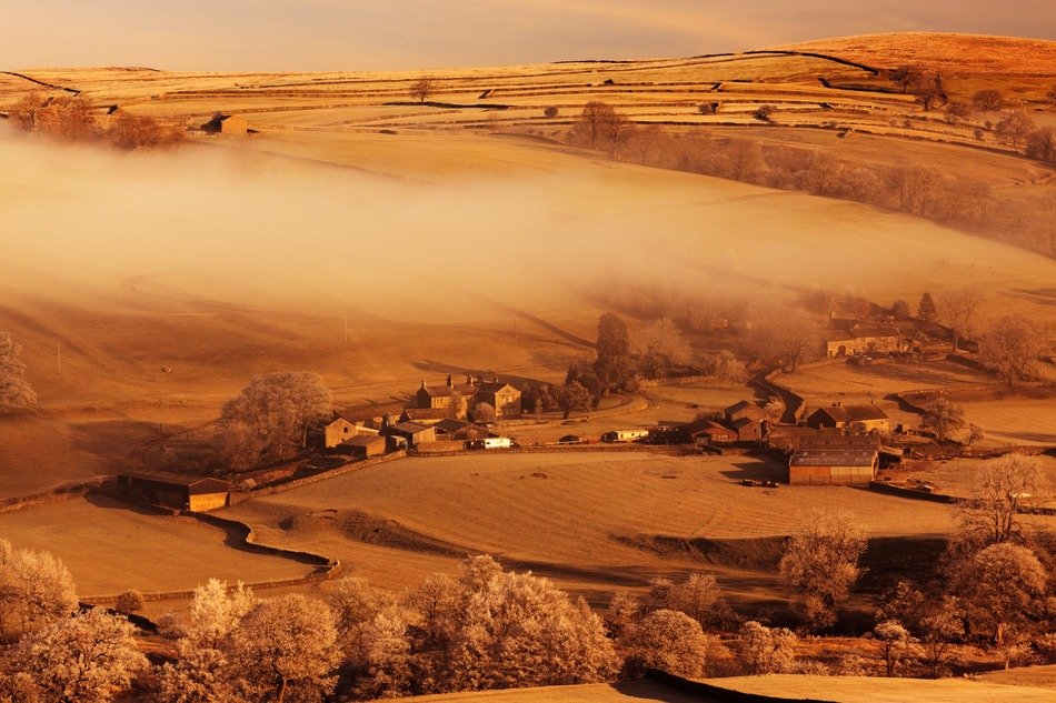 panorama of the village in the fog