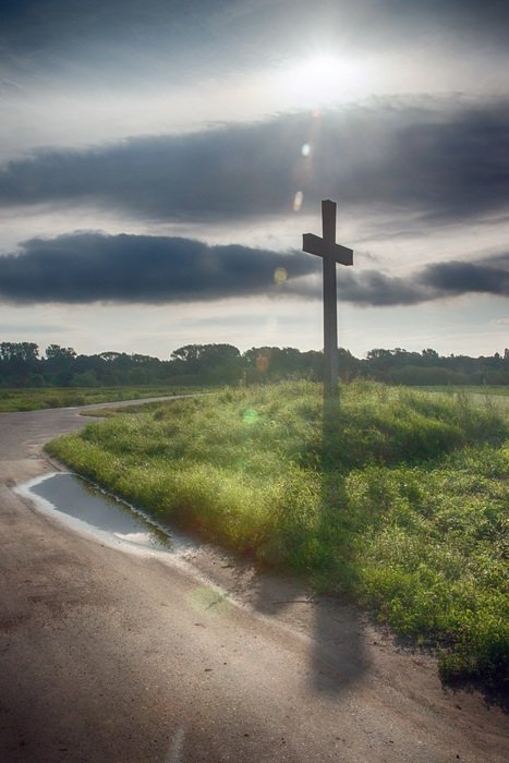 Christian cross on the edge of a country road in Saarland, Germany