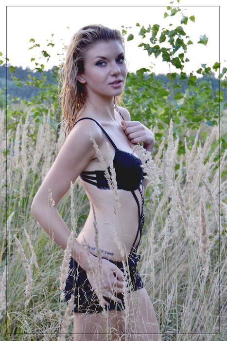 girl in underwear in the field