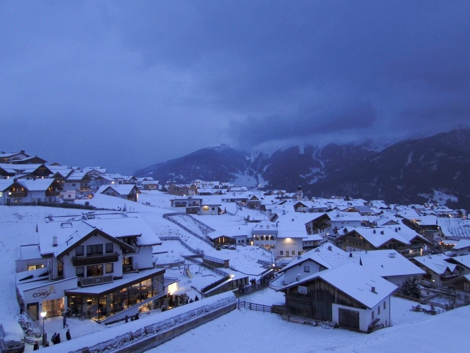 foggy twilight over alpine village