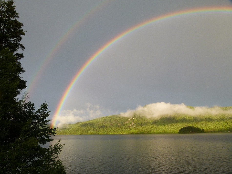 double rainbow over the water