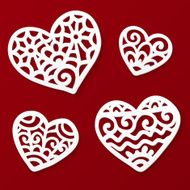 Vector cut out paper lacy hearts