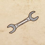 Wrench on Grunge Background