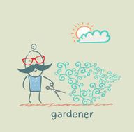 Gardener cuts a bush