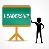 Man points to leadership word on green board