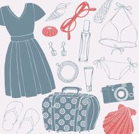 Vacation holiday card with women&#039;s clothes for the trip