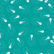 light bulb idea icon on green background seamless pattern
