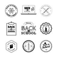 Black and white school badges