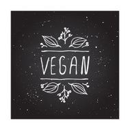 Vegan product label on chalkboard