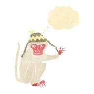 cartoon monkey wearing hat with thought bubble N8