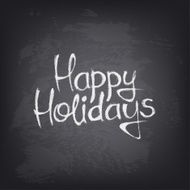Hand drawn Happy Holidays text on blackboard
