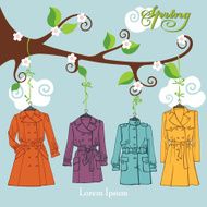Spring Fashion Woman coats hang on a branch