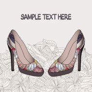 Vector background with an elegant pair of women&#039;s shoes