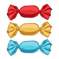 Set of candies in wrappers - red yellow blue