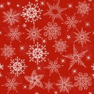 seamless pattern with snowflakes on red background