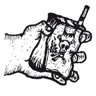 Hand holding a packet of cigarettes