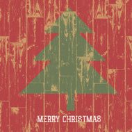 Christmas tree symbol and greetings on wooden planks texture Ve