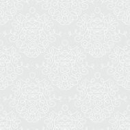 White damask texture with curling shapes