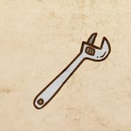Adjustable Wrench on Grunge Background