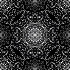 Openwork white pattern of mandalas