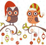 Christmas card of owls in hats sitting