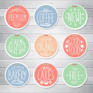 Vintage food labels on wooden background Hand-drawn lettering