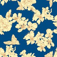 Seamless background with butterflies and blossom apricot on blue