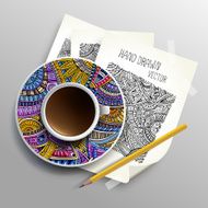 Coffee cup on sketches and paper N2