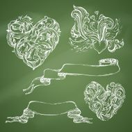 Set of romantic design elements on chalkboard background