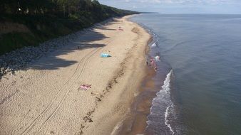 people on the beach of the Baltic Sea in Poland