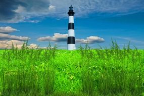 red white lighthouse in green areas