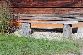 bench near the wooden house