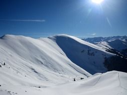 snow-capped mountains on a sunny day