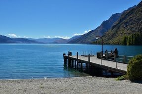 pier on the peaceful mountain lake